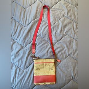 Stylish Tan and Pink Crossbody Coach Bag